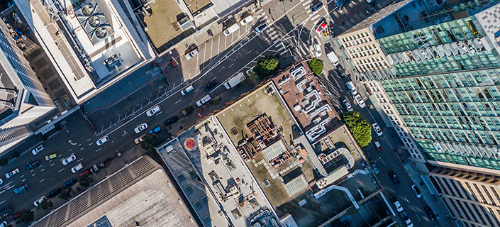 An aerial birds eye  view of San Francisco looking straight down at the skyscrapers and streets in the financial district.